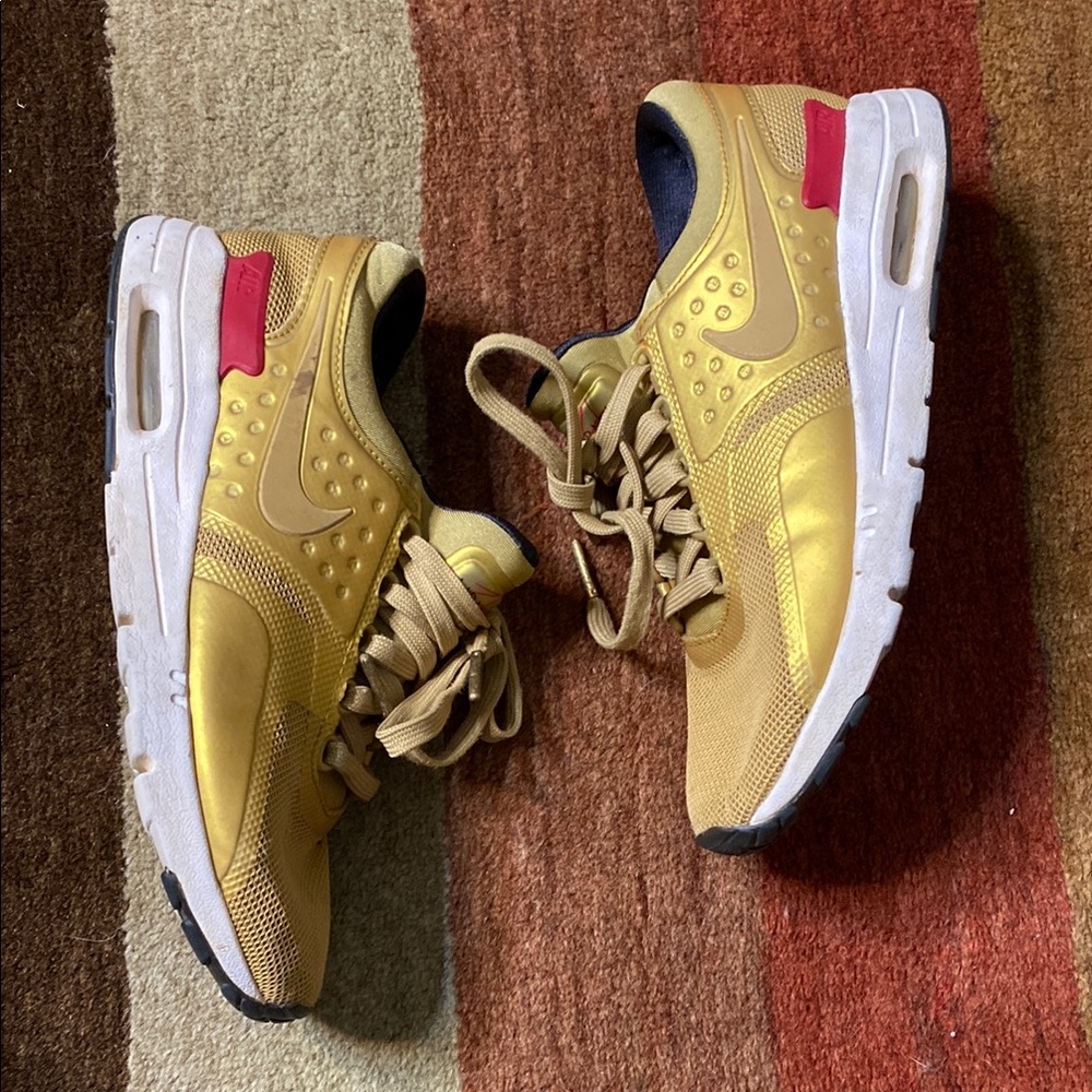 Nike Gold and Red Sneakers with Air Max Cushioning